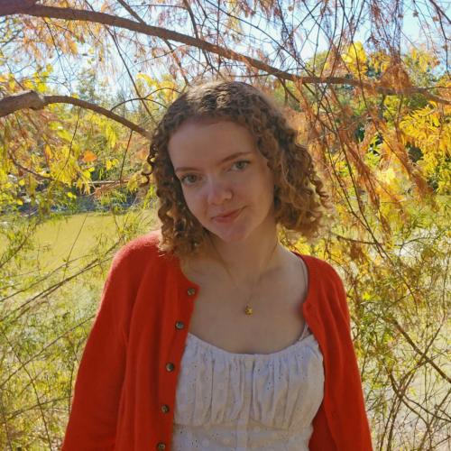 Laura with trees in the background