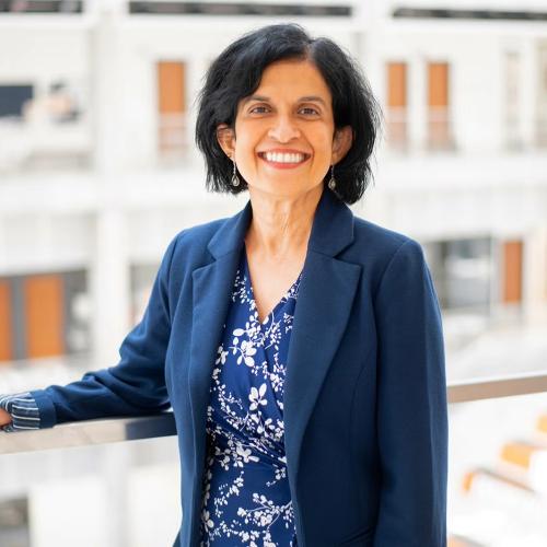 Dr. Telang headshot with blurred background