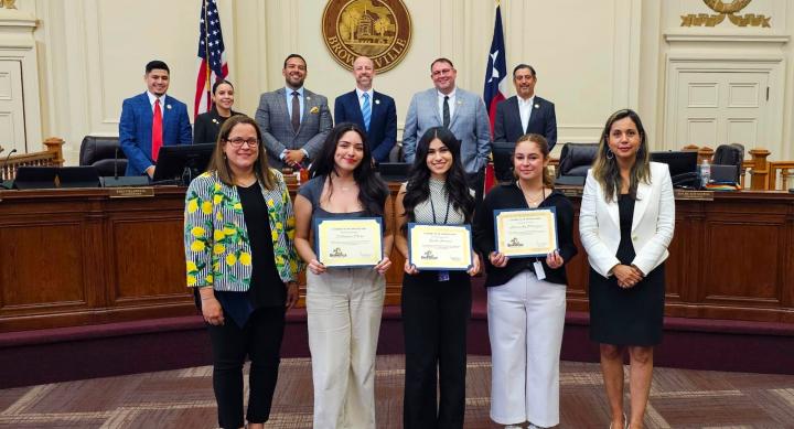 Karla Jimenez receiving an award