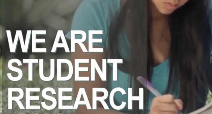 Woman writing in journal. Headline: We are Student Research