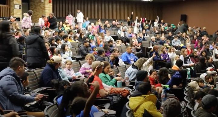 STEM Girl Day event–auditorium filled with students and parents