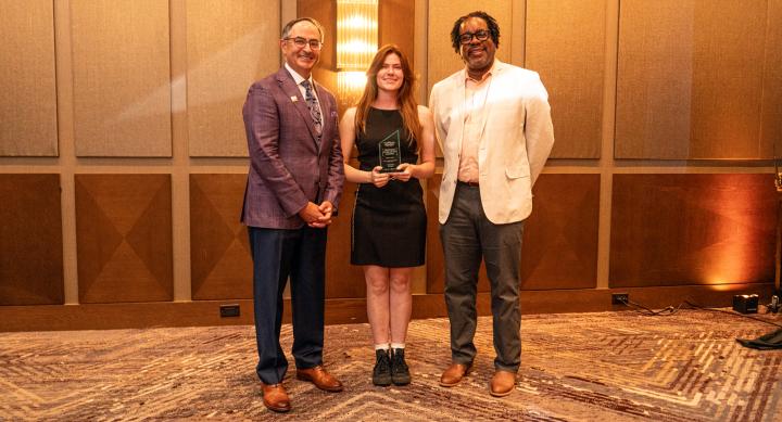 Paxton Smith holding award