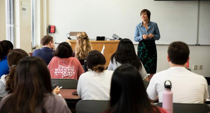 Faculty member teaching in front of class
